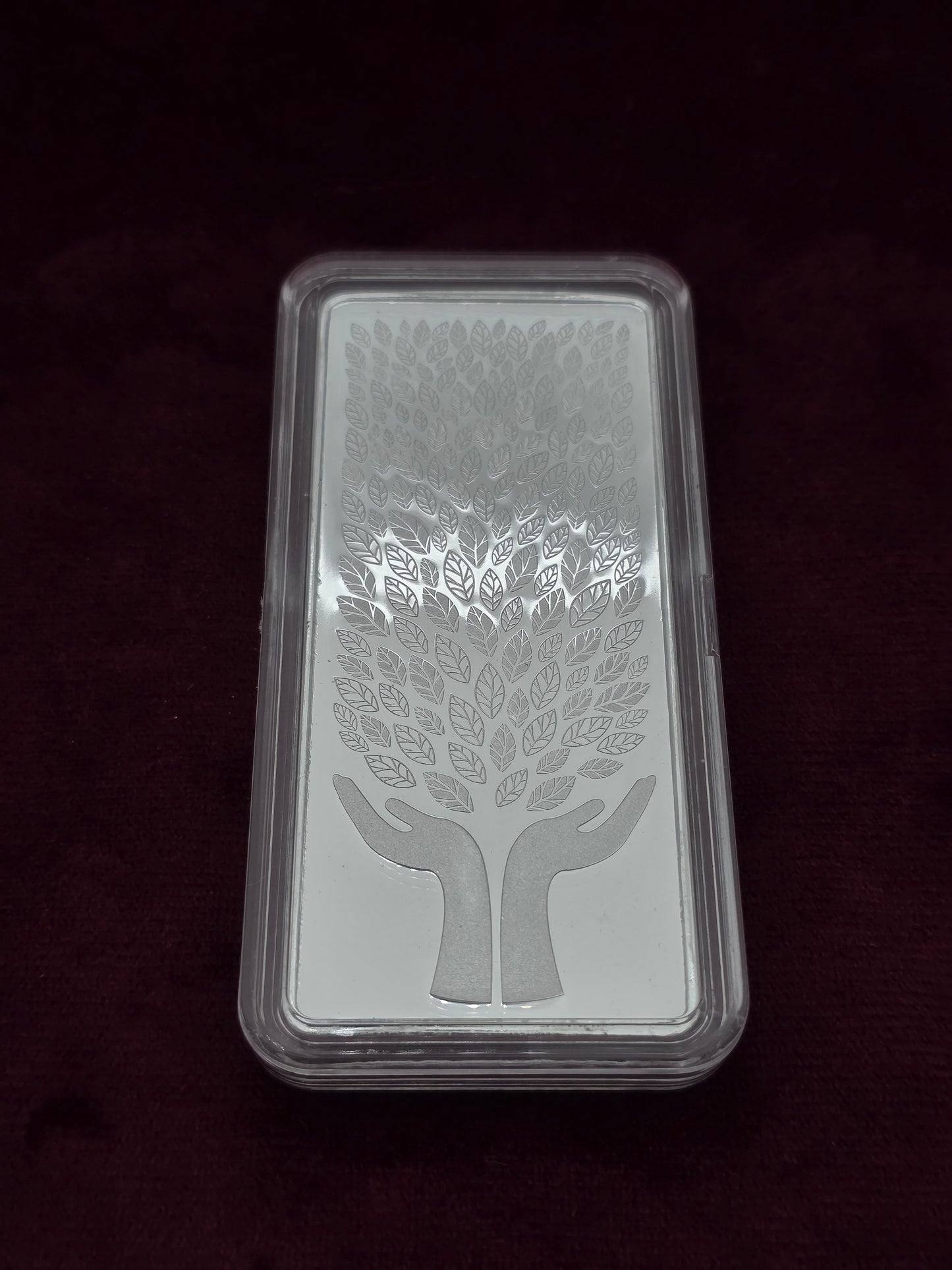 LEAF IN THE HAND PURE SILVER BAR 100GM