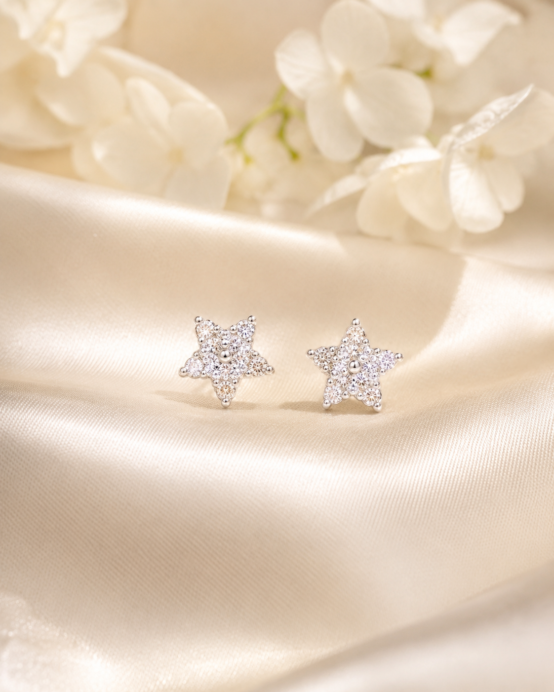 925 SILVER STAR SHAPED EARSTUDS GE411