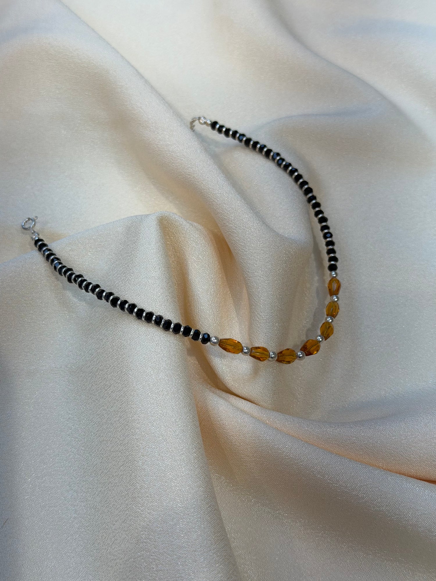 ORANGE/BLACK BEADS NAJARIYA 9IN