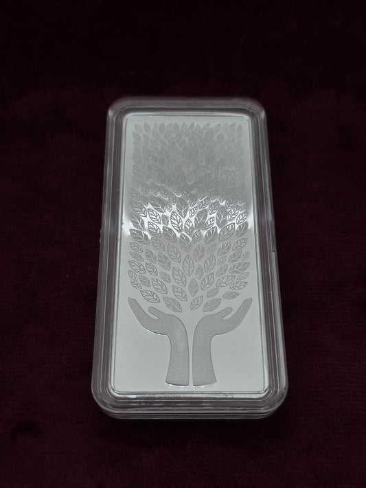 LEAF IN THE HAND PURE SILVER BAR 100GM